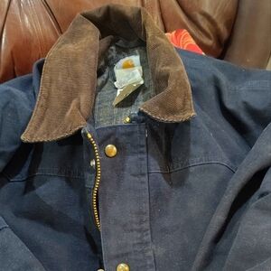 Carhartt Men's navy blue c52 duck canvas jacket with blanket inside cord. collar